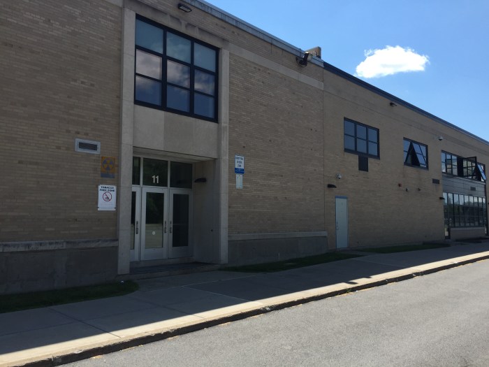 Lockport High School exterior fallout shelter sign