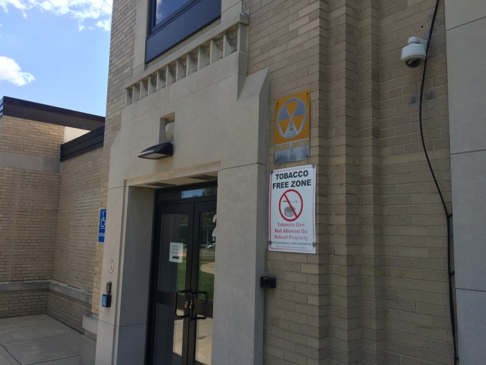 Lockport High School exterior fallout shelter sign
